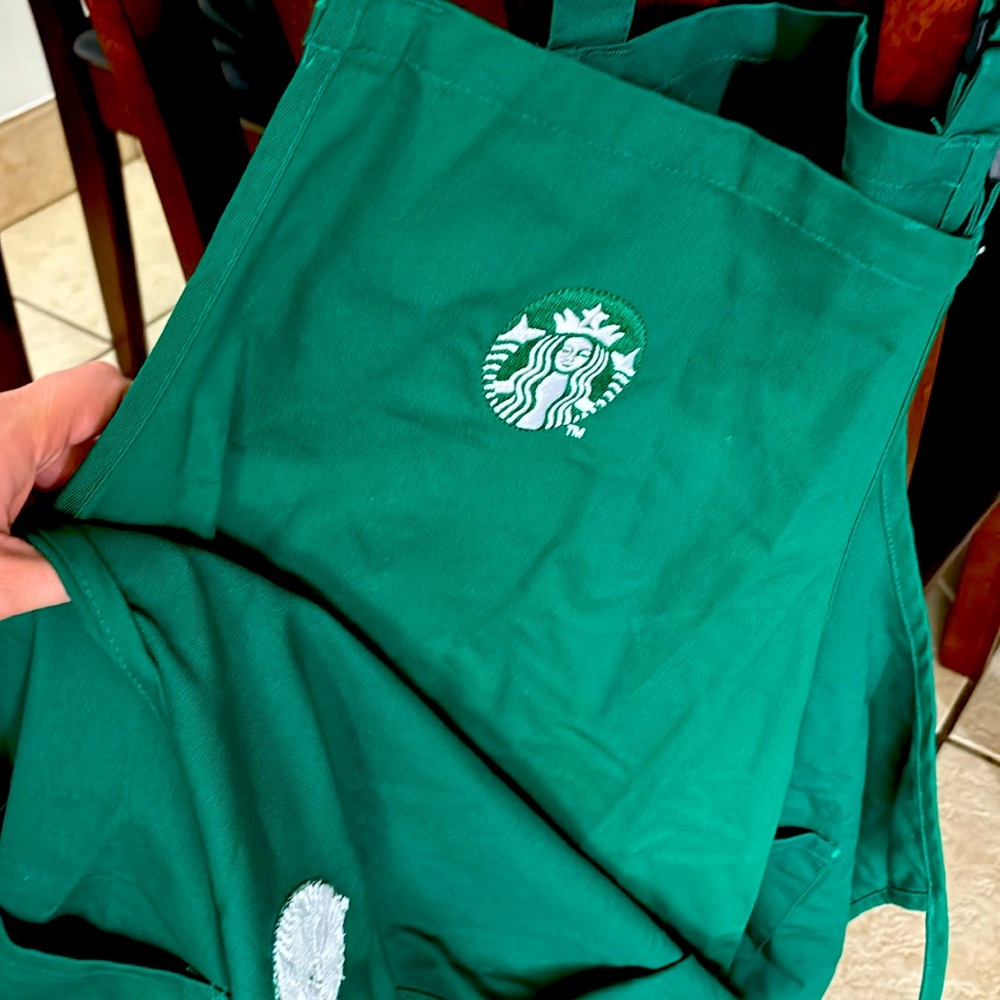 3 green Starbucks aprons